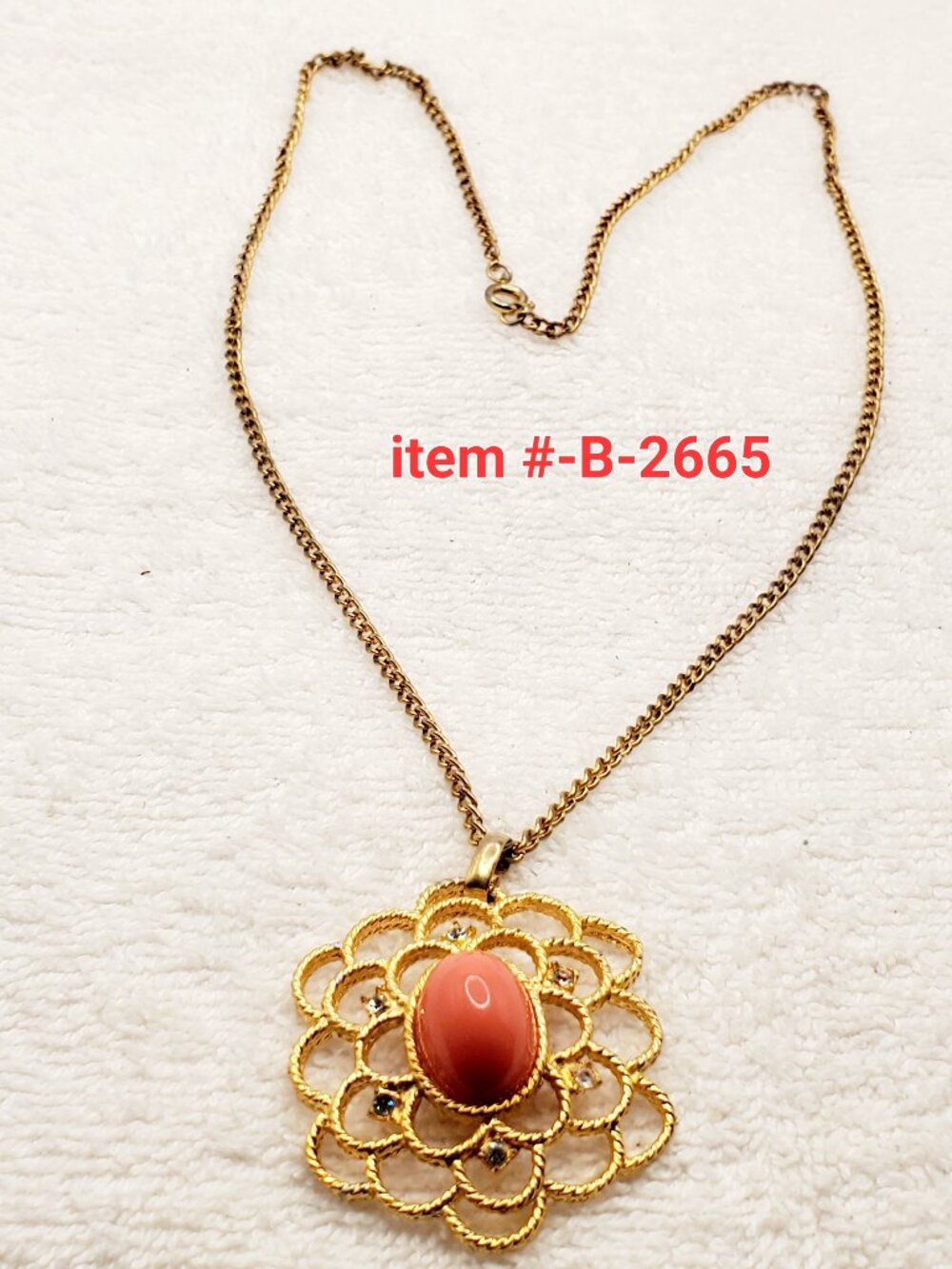1 gold tone Necklace with pendant, item # B-2665,. wt. 20 grams.